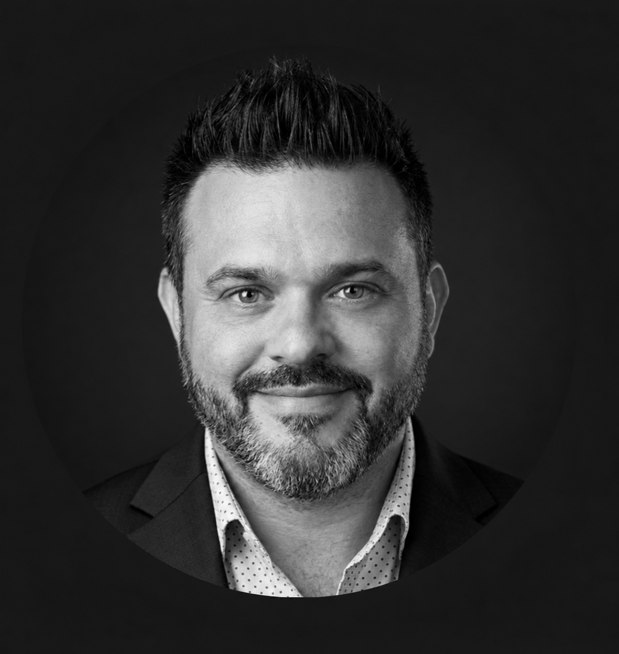 Jeffery Hartman, known as The Don of Debt, in a grayscale executive portrait.